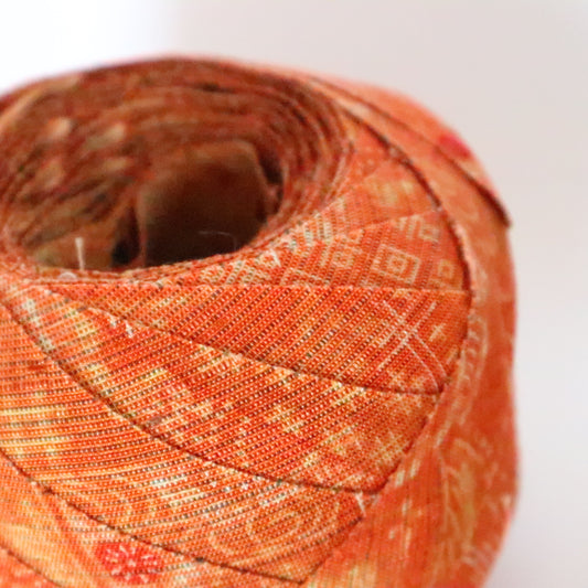 淡いオレンジ(紅樺色)の更紗柄・紬(Y02312015)