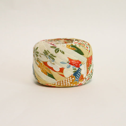 卵色に色とりどりの草花模様・縮緬(Y02605001)