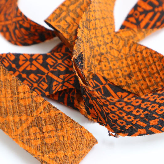 黒に橙色の鹿子や菱柄・縮緬(Y02009109)