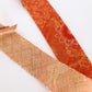 淡いオレンジ（紅樺色）の更紗柄・紬（Y02312015）