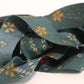 深緑に赤や黄色の小花模様・縮緬　(Y02605008）