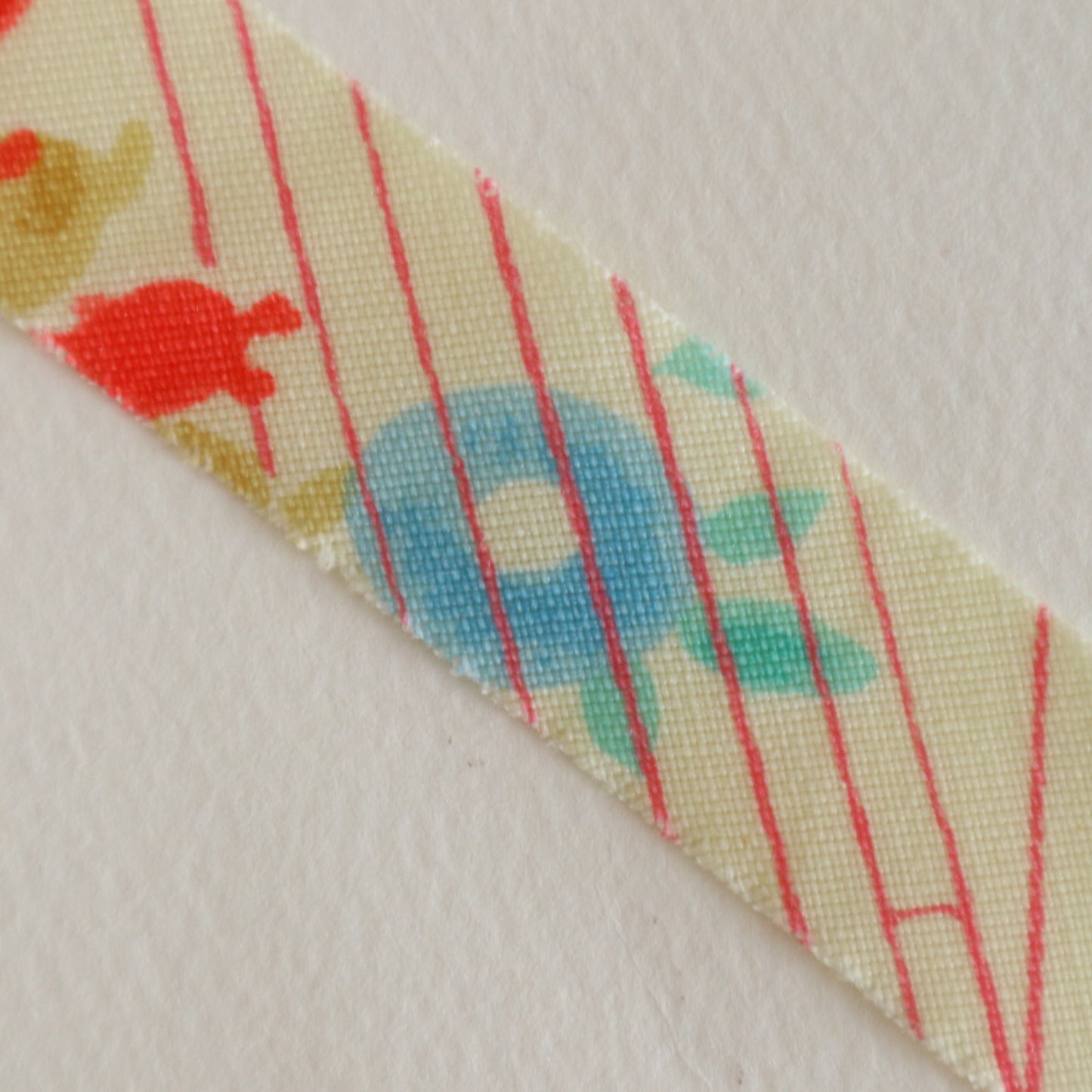 卵色に色とりどりの万寿菊柄・交織(Y02601012）