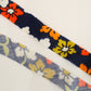 紺色にカラフルなレトロ花柄(Y02605005）