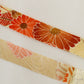 白・黄・薄桃色・オレンジの亀甲つなぎや青海波など吉祥花柄(Y02605002）